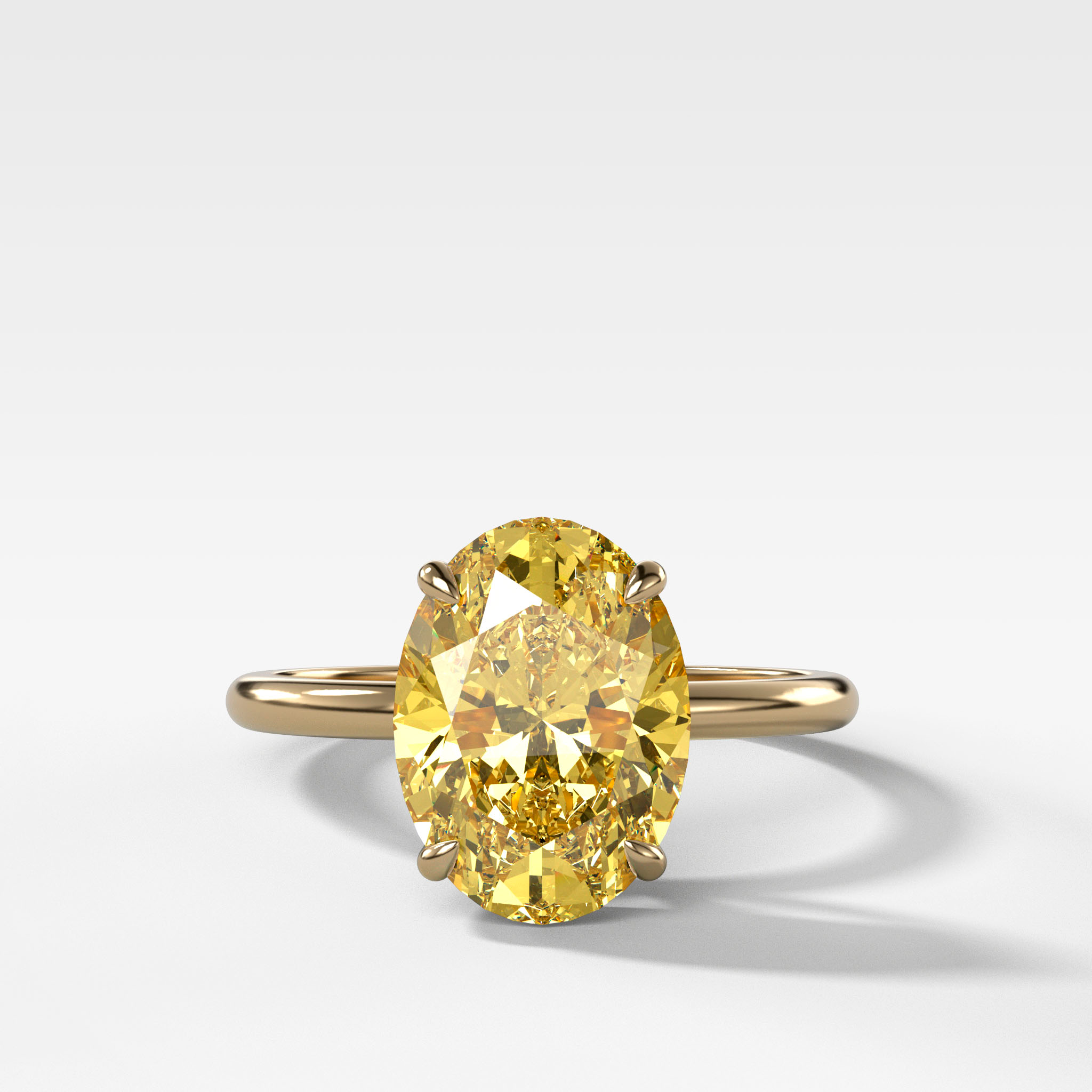 GOODSTONE Thin + Simple Solitaire Engagement Ring With Canary Yellow Oval Cut Diamond
