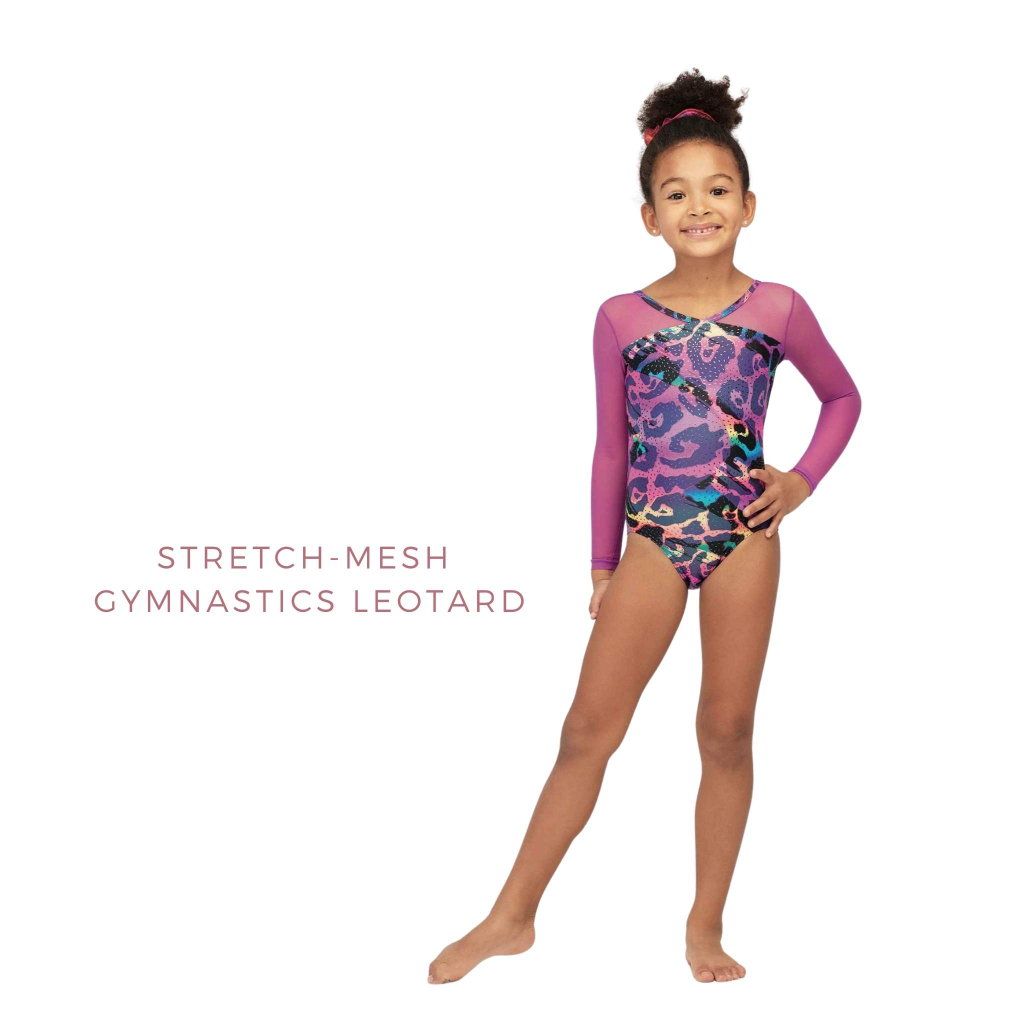 Young girl wearing long sleeve stretch-mesh gym suit from Mondor's 2022 collection.