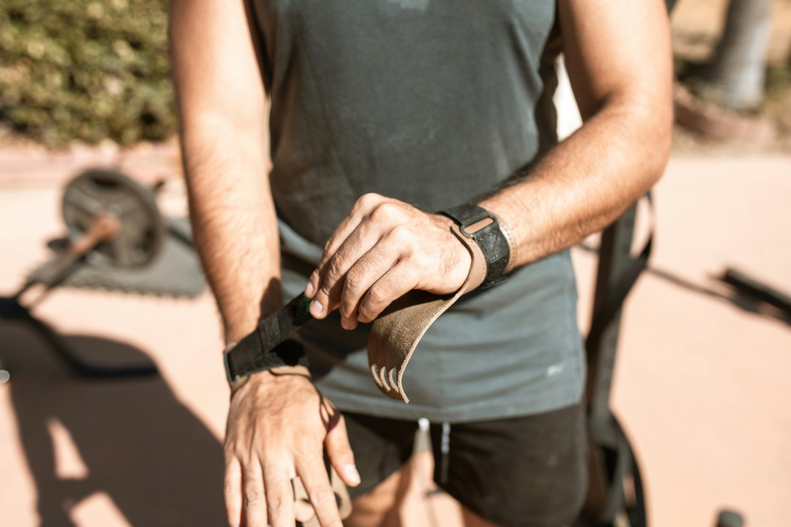 Photo by RDNE Stock project: https://www.pexels.com/photo/man-putting-on-wrist-straps-5837213/