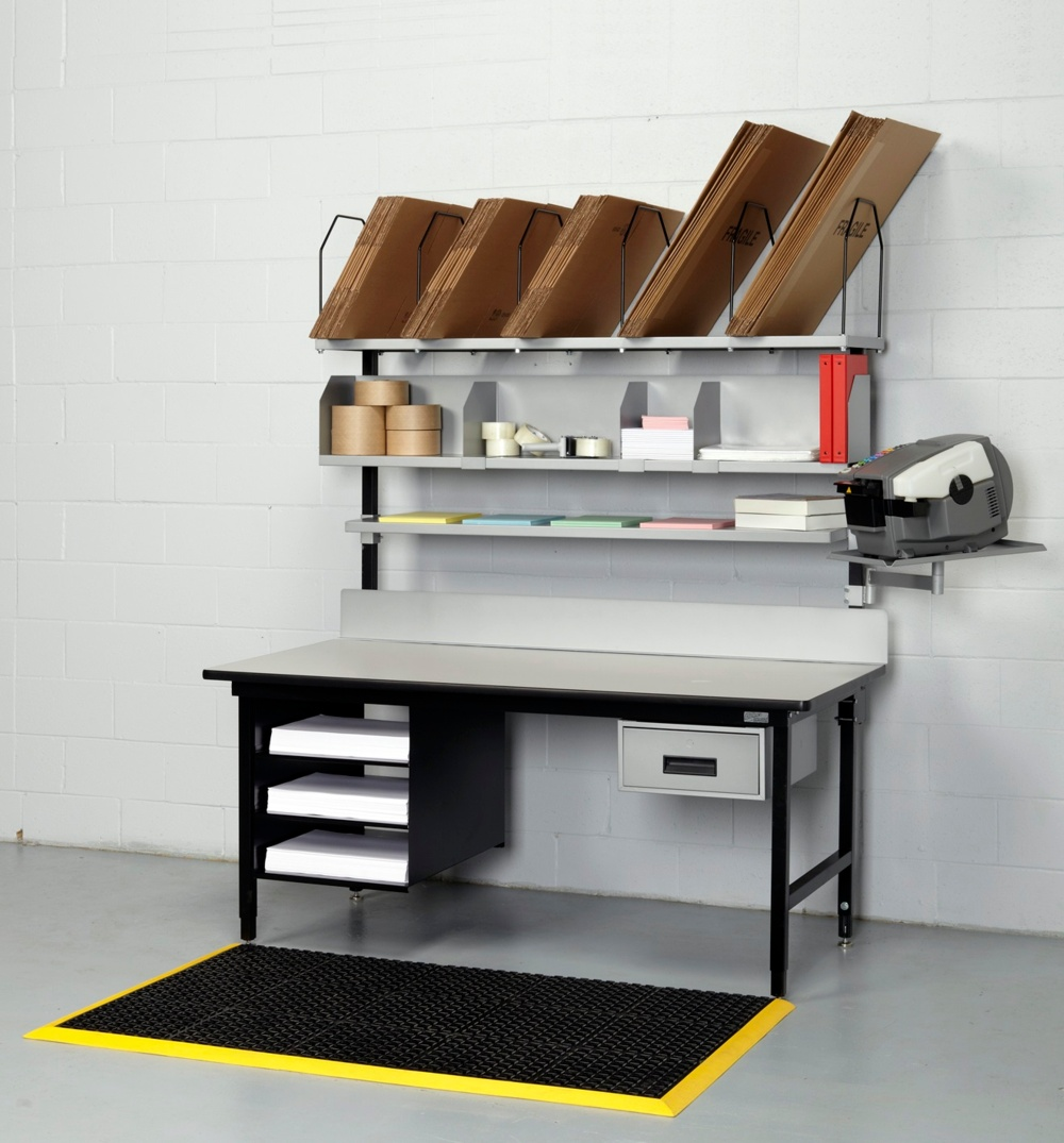 Customized packing table with adjustable height and additional storage