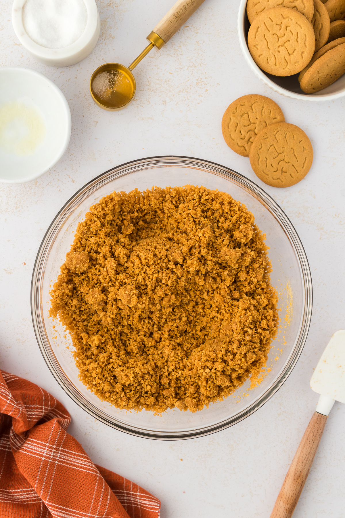gingerbread cookie crust mixture in a bowl