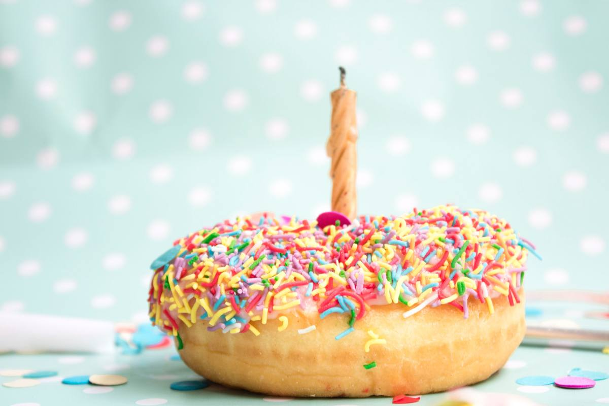 Happy Birthday doughnut with candle and sprinkles with happy birthday messages for my only person - Fabulous Flowers