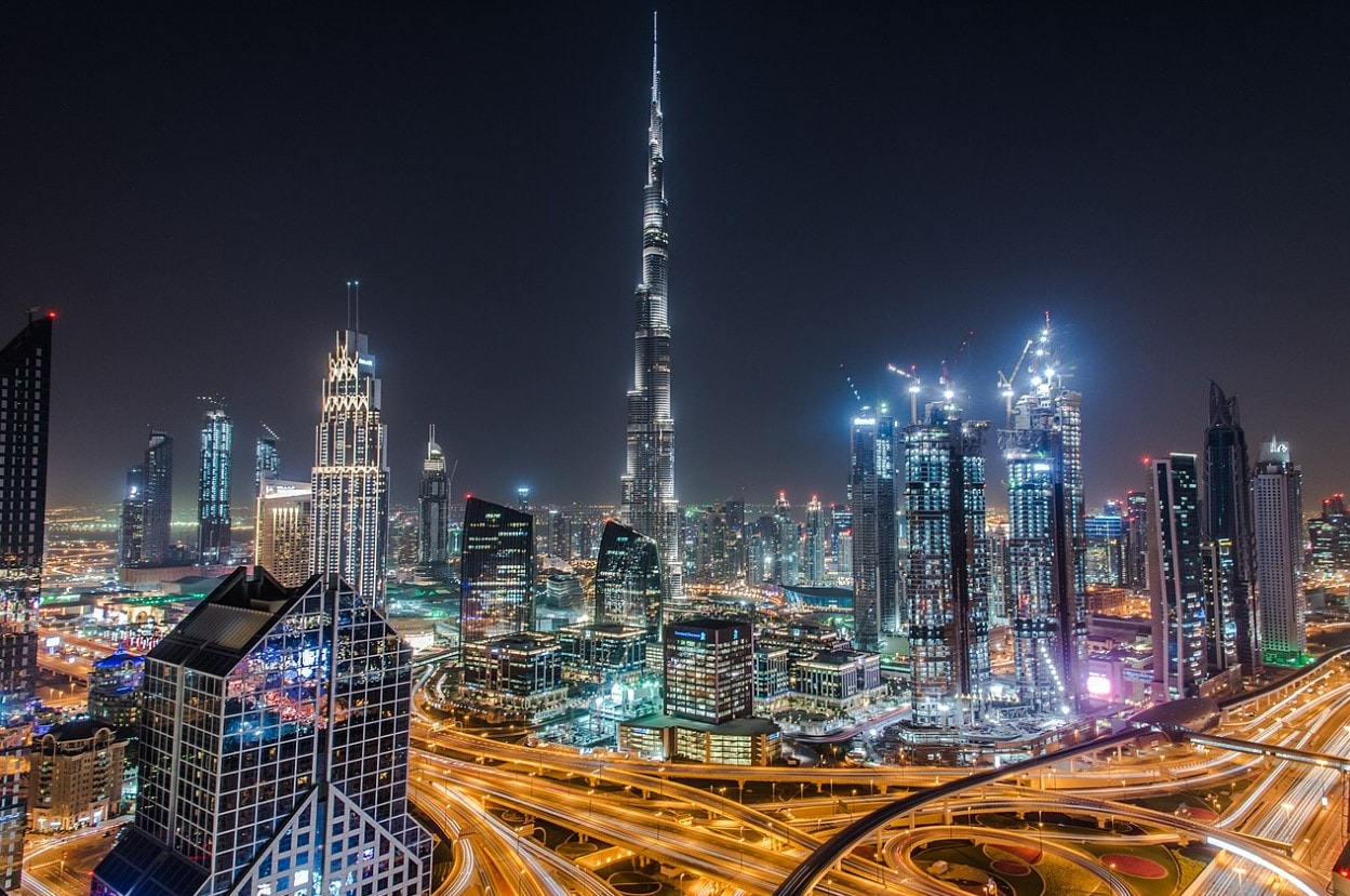 An aerial view of Dubai showcasing its modern architecture and vibrant lifestyle, making it an emerging hub for crypto traders.