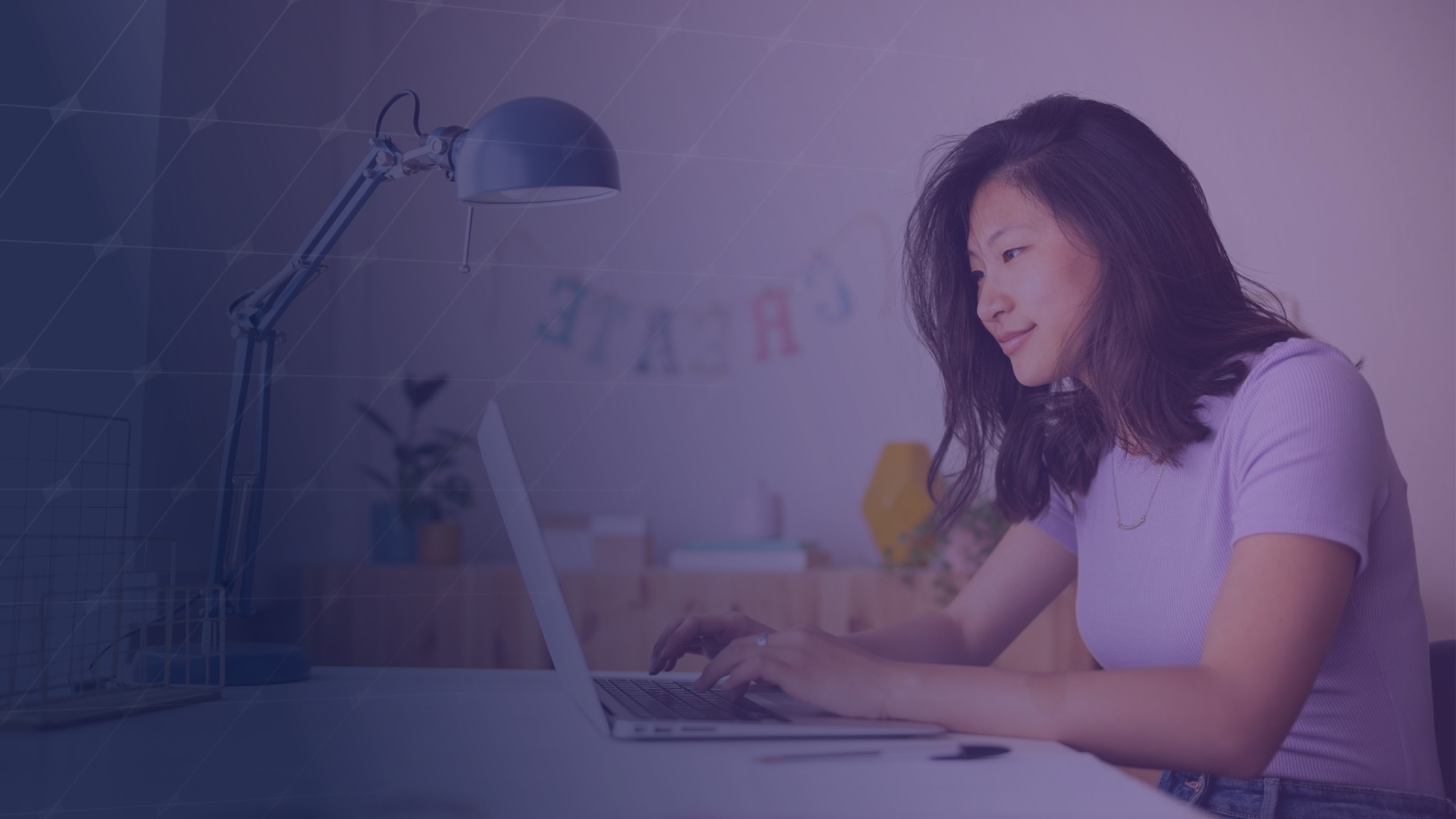 Woman typing on a laptop in a home office, representing content creation across the marketing pipeline.