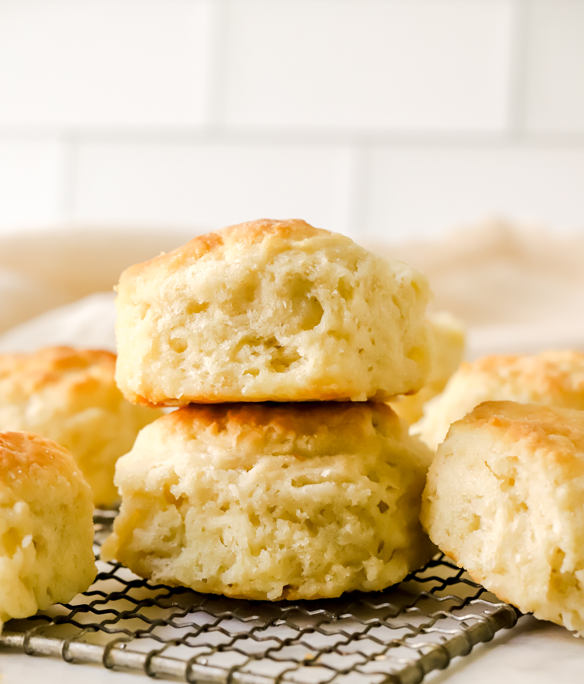 two flaky biscuits stacked on top of each other