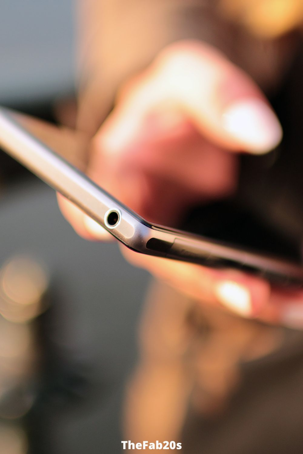 Womans hand checking phone