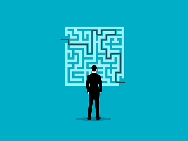 Illustration of a man standing in front of a maze on a blue background