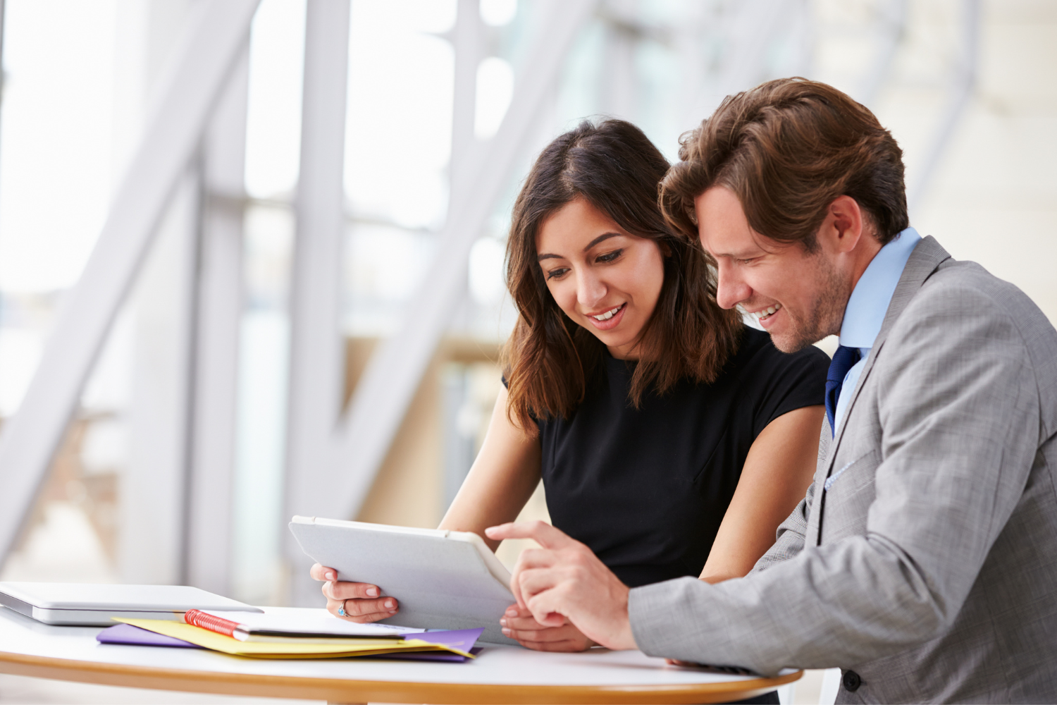 Two professionals helping each other.