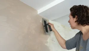 Het aanbrengen met een spaan of kwast