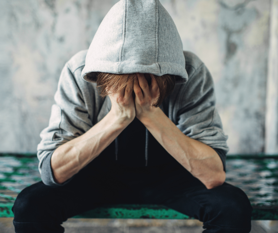                                                 A person struggling with alcohol withdrawal symptoms