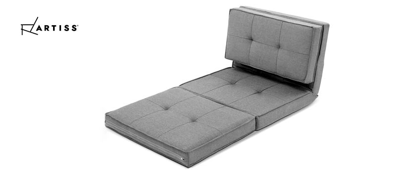 An Artiss grey fabric single seater floor lounger.