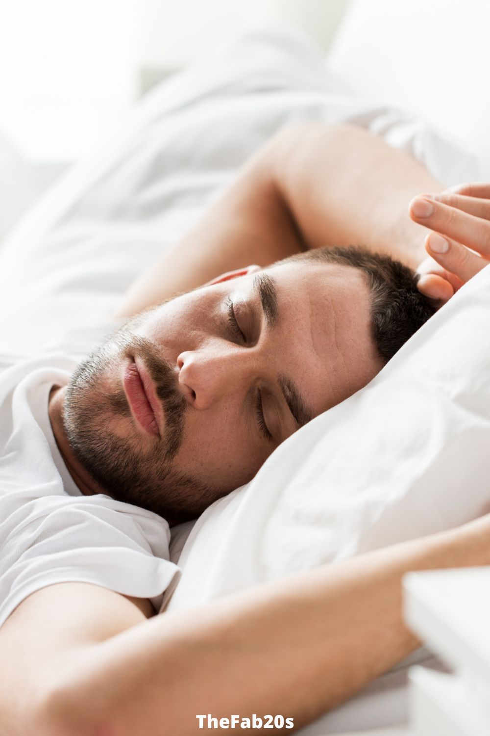 Man in bed sleeping - Featured in Signs He Only Wants You For Your Body