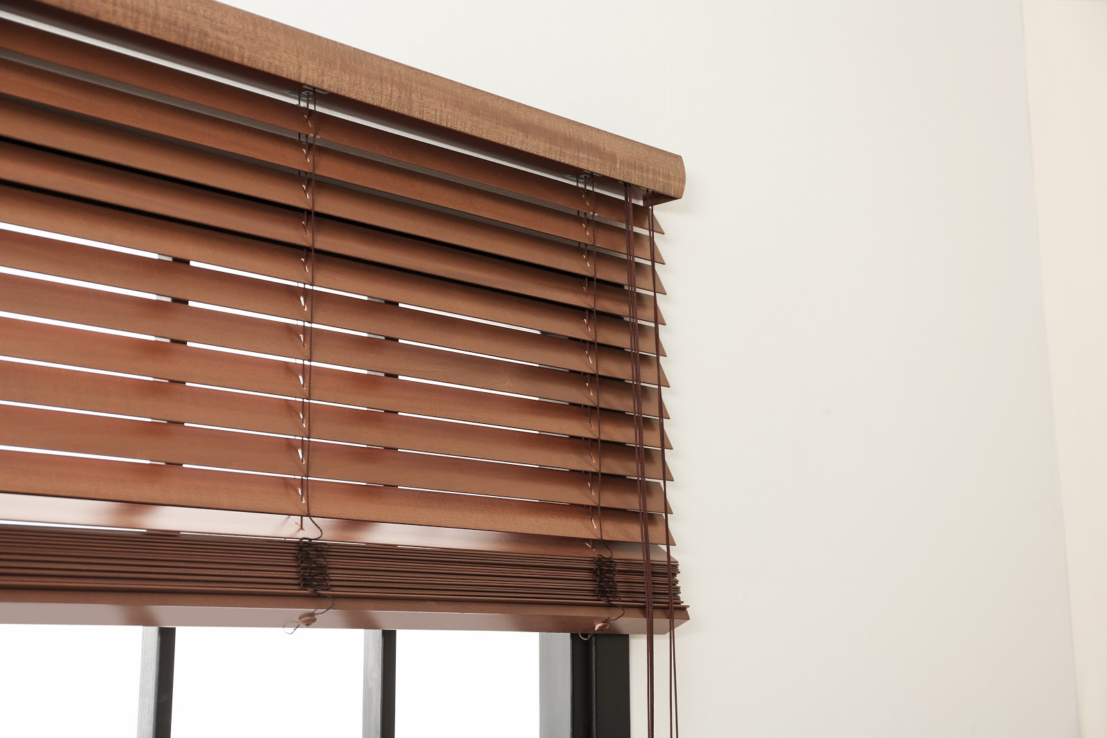 Clean your wooden Venetian blinds using furniture polish