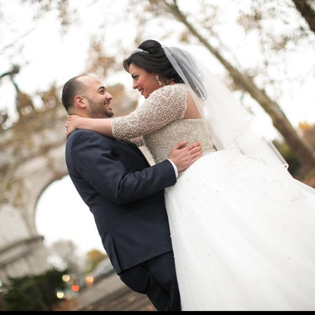  A bride wearing a traditional A-line wedding gown