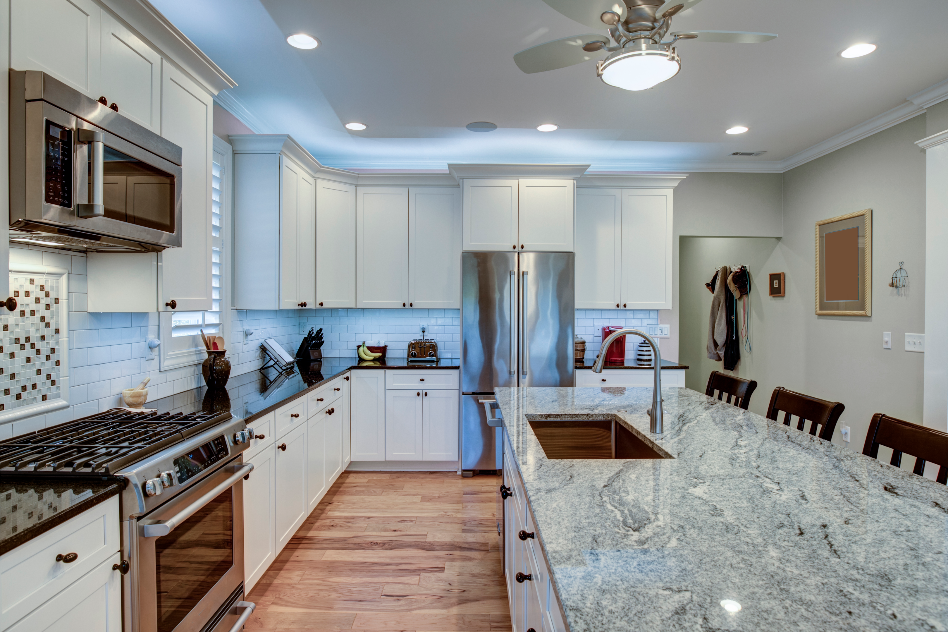 A kitchen with different countertop materials