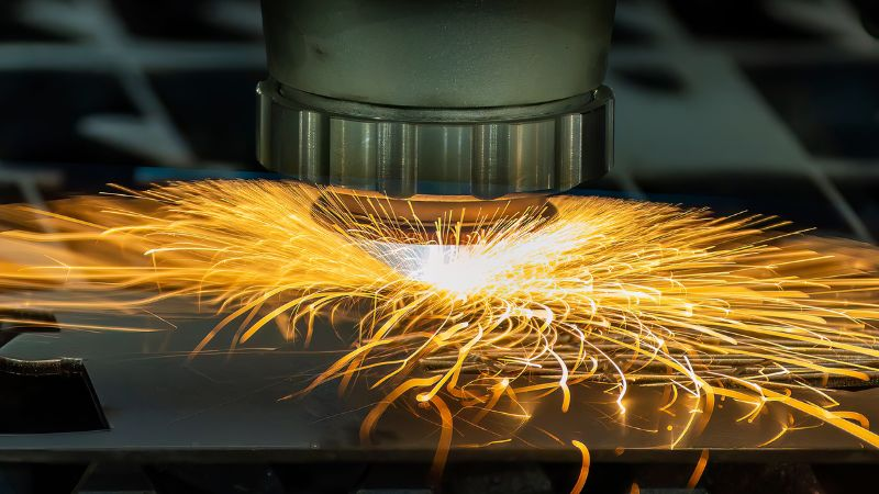 Fiber laser cutting machine cutting a metal sheet.
