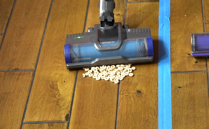 Shark iz340h picking up cereal on hardwood