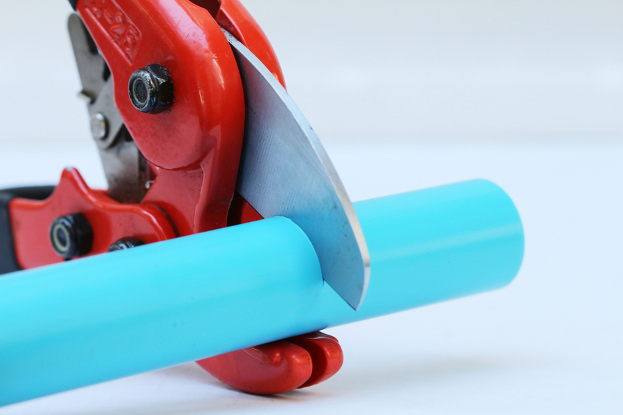Cutting Pipe with a Red Cutter