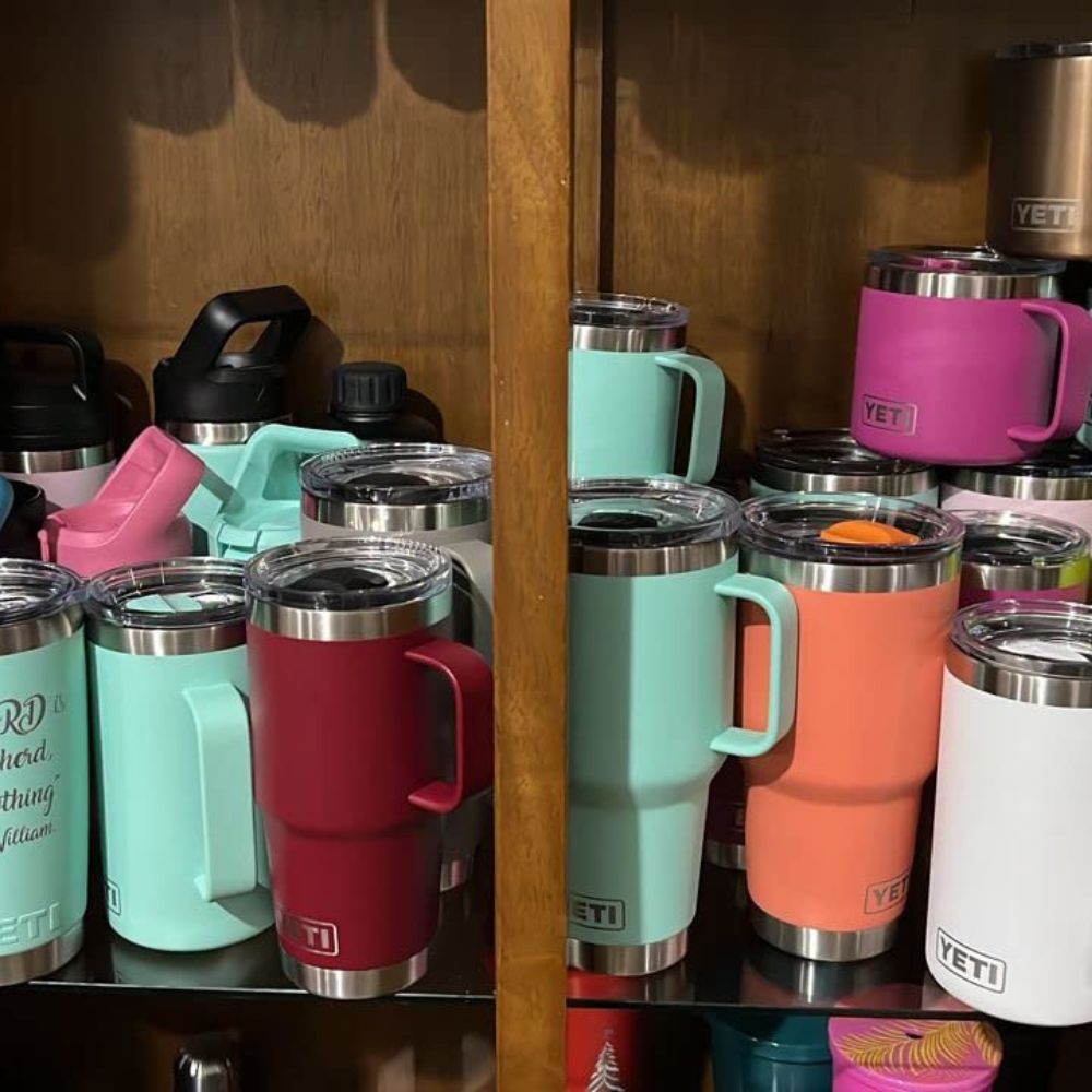 A Yeti Rambler tumbler with a stainless steel body and a straw lid, with a variety of colors and limited edition designs