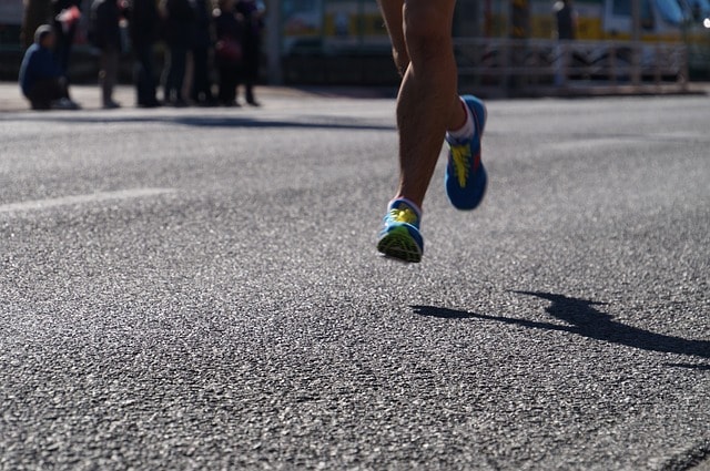 person running on a road symbolizing the importance of a brand identity in e-commerce