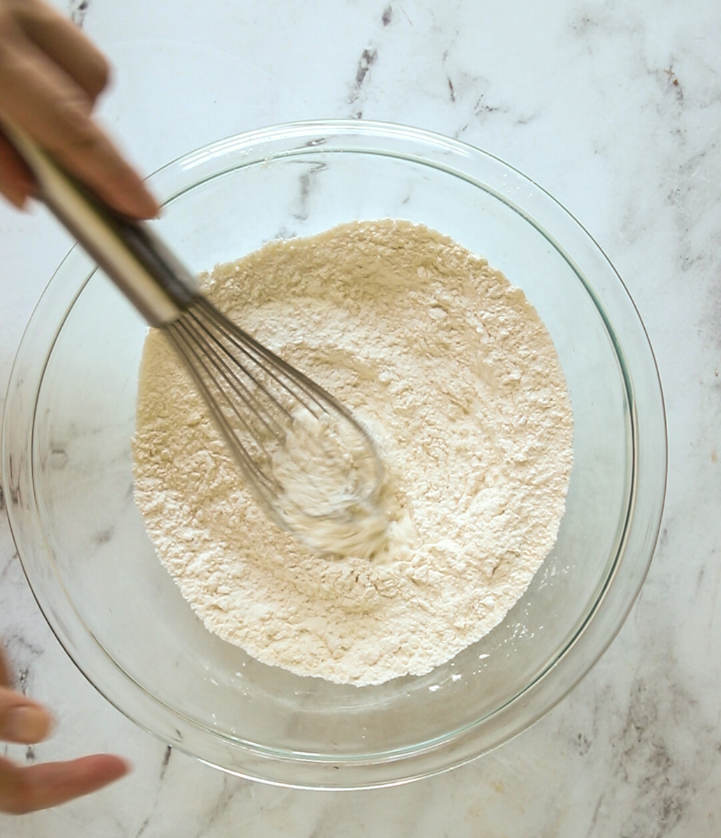 dry ingredients being whisked together