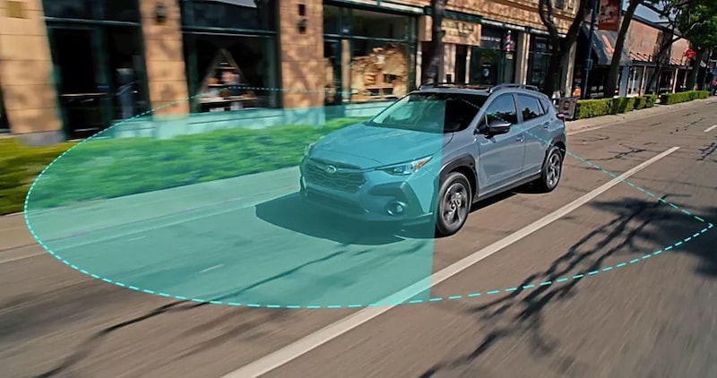 Subaru's advanced safety system scanning surroundings for potential hazards, featured in models at AutoFair Subaru of Haverhill, MA, for enhanced driver confidence.