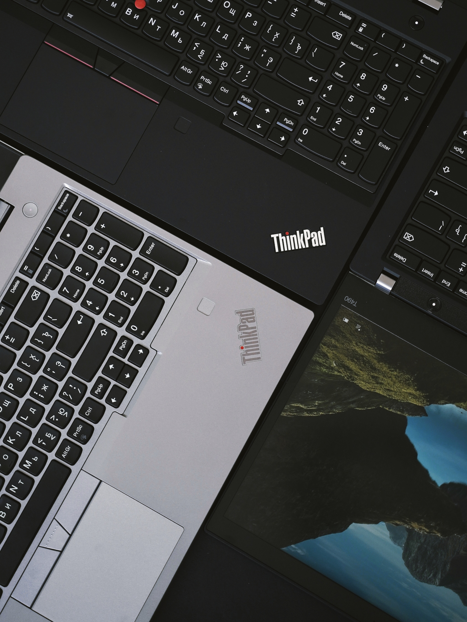 silver and black lenovo thinkpads