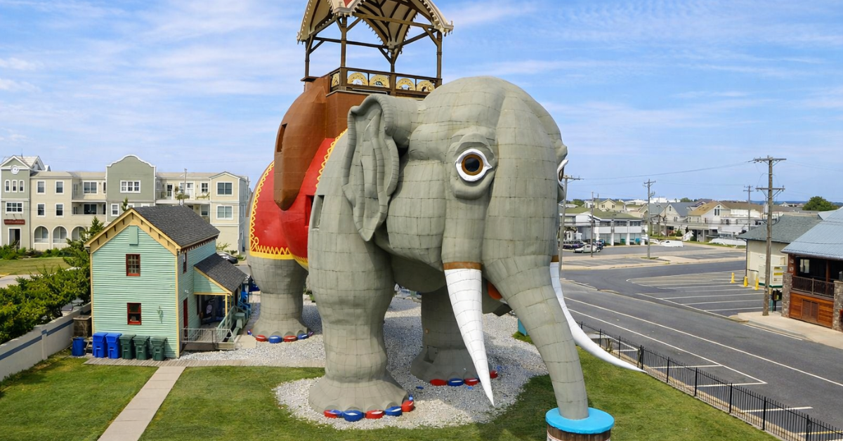 Lucy the Elephant landmark in Margate City, New Jersey, a historic six-story elephant-shaped building surrounded by neighborhood homes and streets.