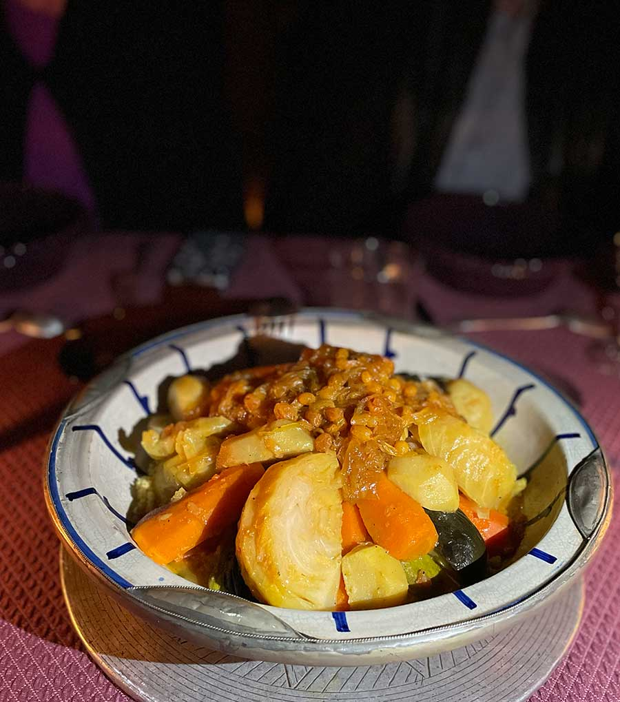 A plate of couscous with vegetables and meat | by CÚRATE Trips ®Paladar y Tomar