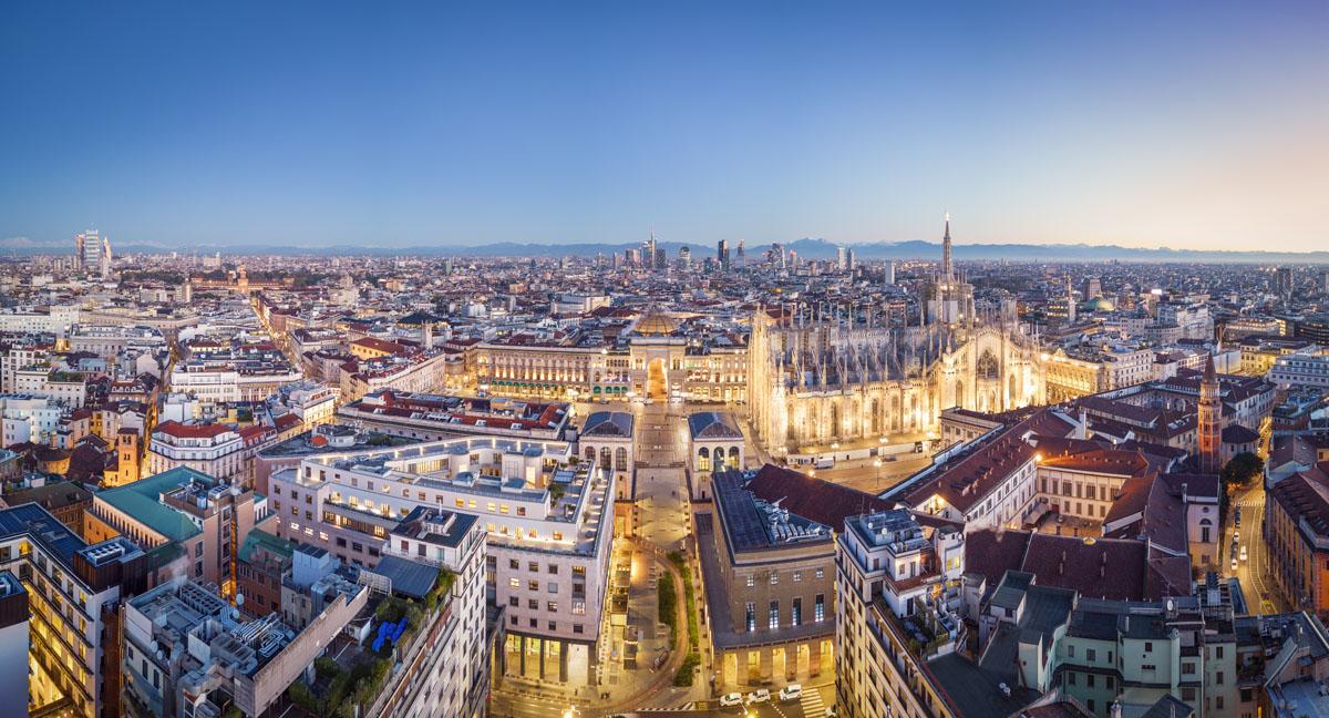 Milan skyline with Duomo cathedral and modern cityscape, representing best places to live in Italy for UK expats, career opportunities and financial hub lifestyle.