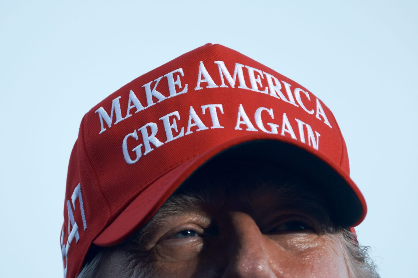 Donald Trump wearing a Make America Great Again Cap