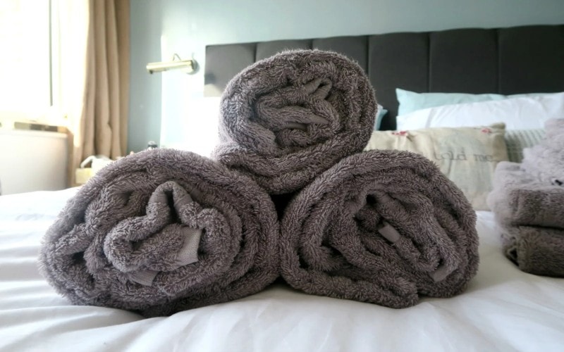 Bamboo towels on bed