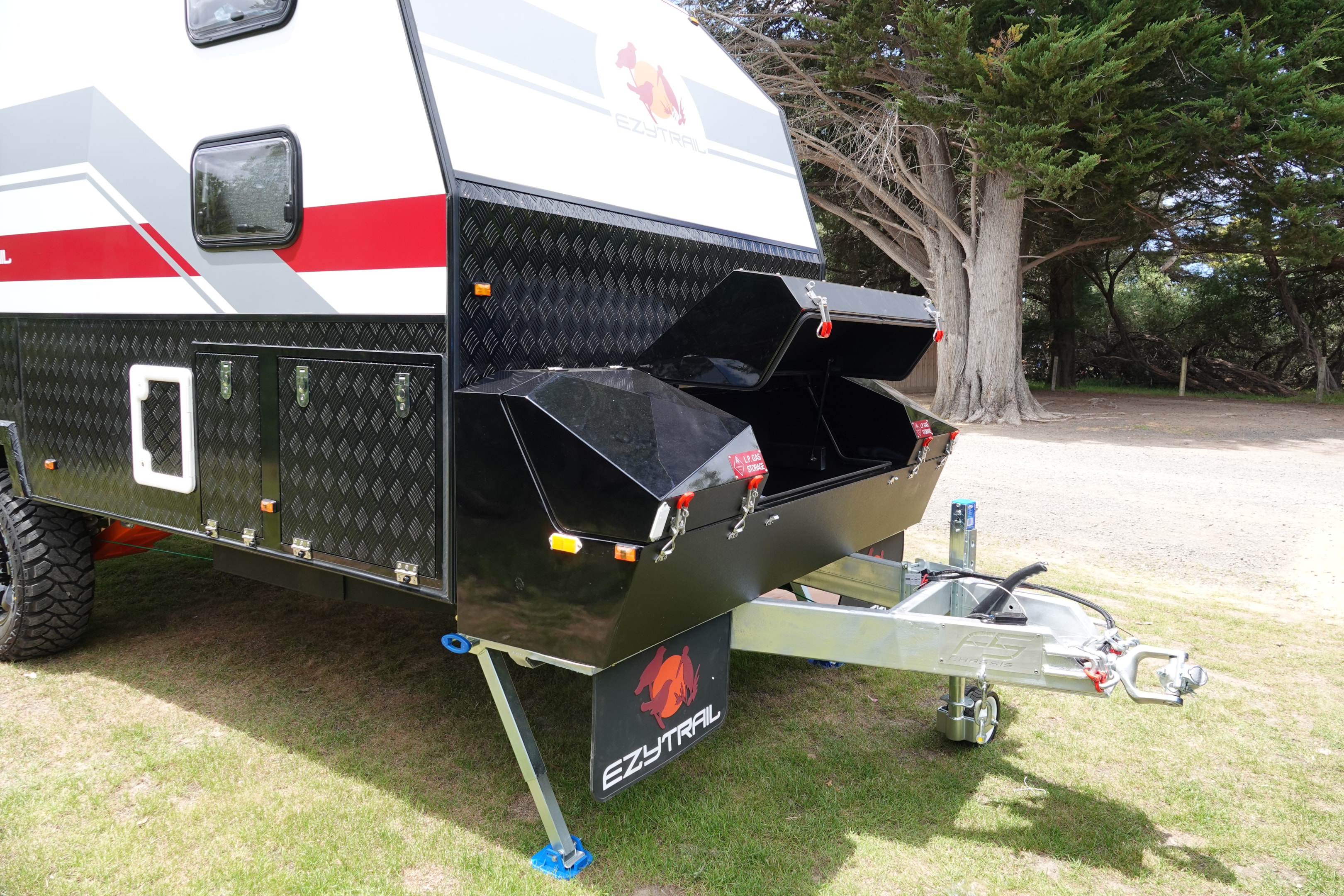 Out in the front storage box is cavernous storage space with gas storage compartments for self sufficient touring.