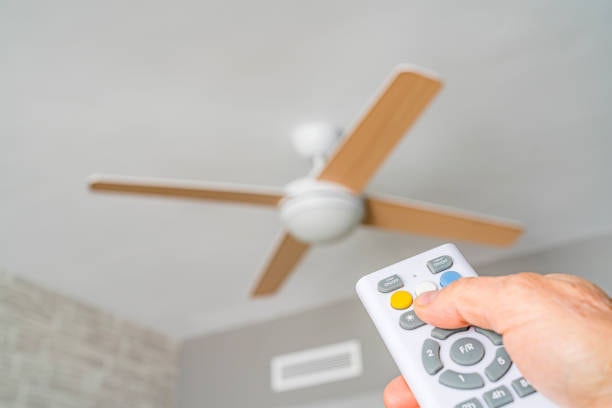 Switching ceiling fan direction with a remote. 