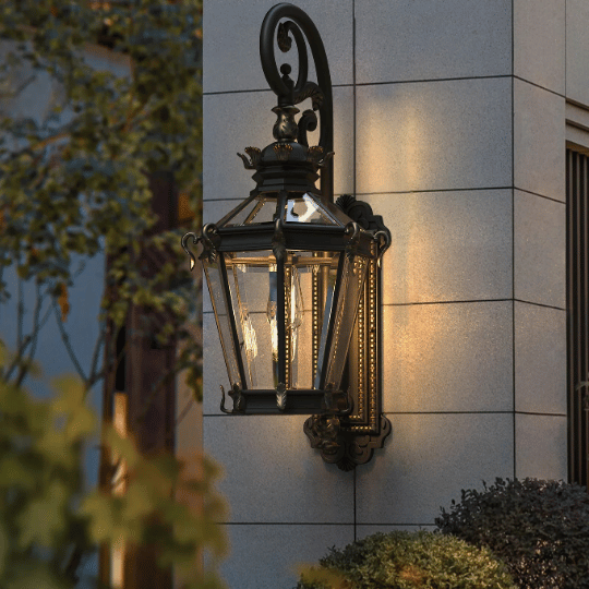 Ornate vintage outdoor wall lantern with black metal frame, curved arm, and clear glass panels, classic vintage lighting idea for exterior walls.