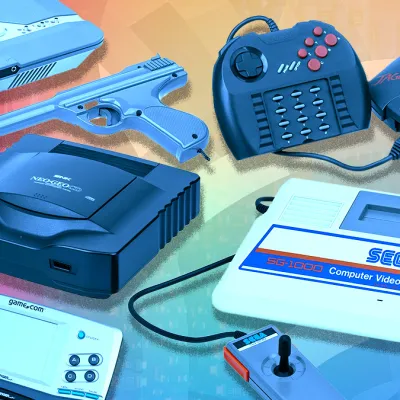 An assortment of retro gaming controllers from various console generations is displayed on a table, showcasing a nostalgic collection for gaming enthusiasts. This vibrant array highlights the evolution of gaming accessories, perfect for those who love to play and collect.
