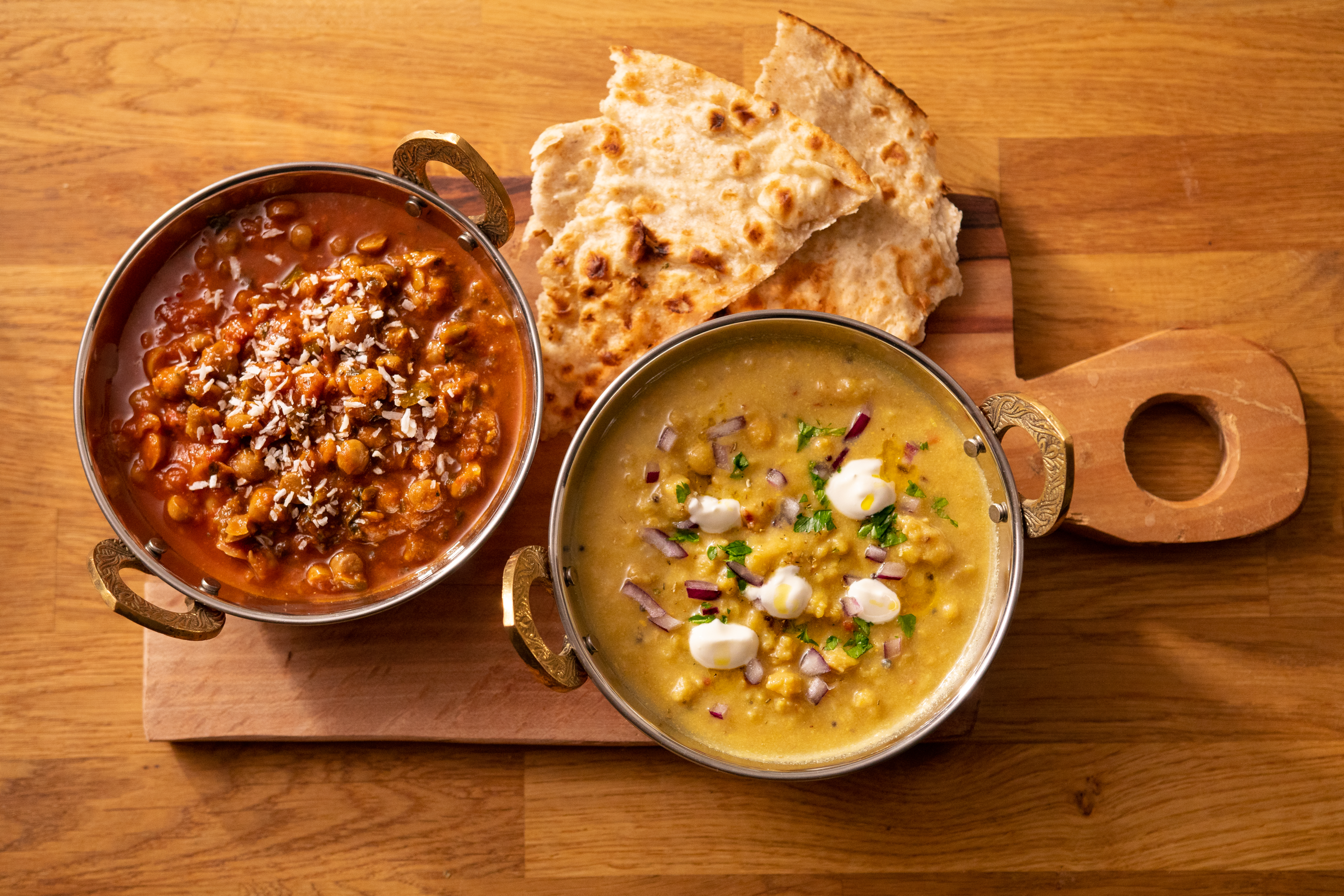 A chana masala or lentil dahl with peta bread