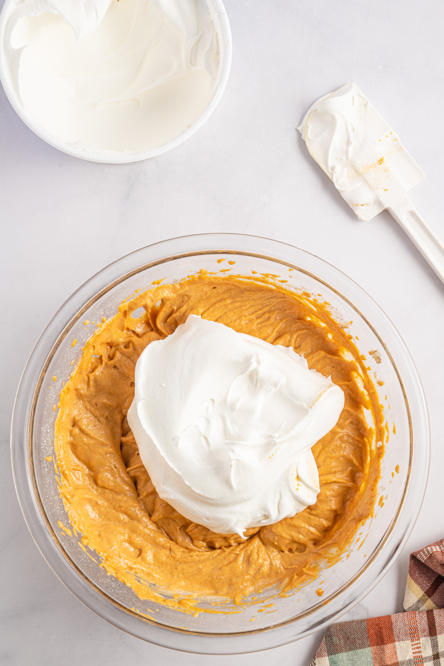 whipped cream added to pumpkin pie dip mixture