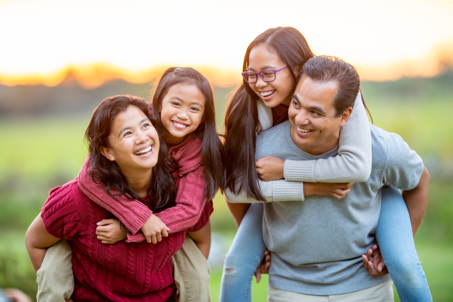 A Filipino family having fun outside.