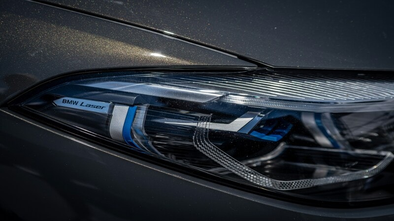 BMW laser headlight with glossy 4D carbon fiber vinyl wrap