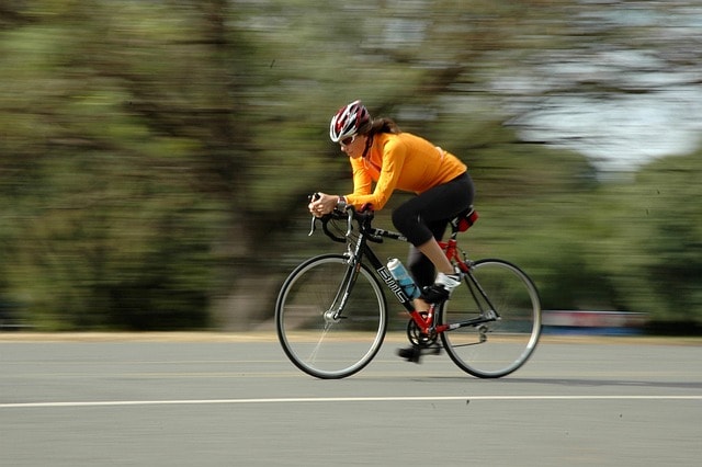 An athlete cycling on a bike.