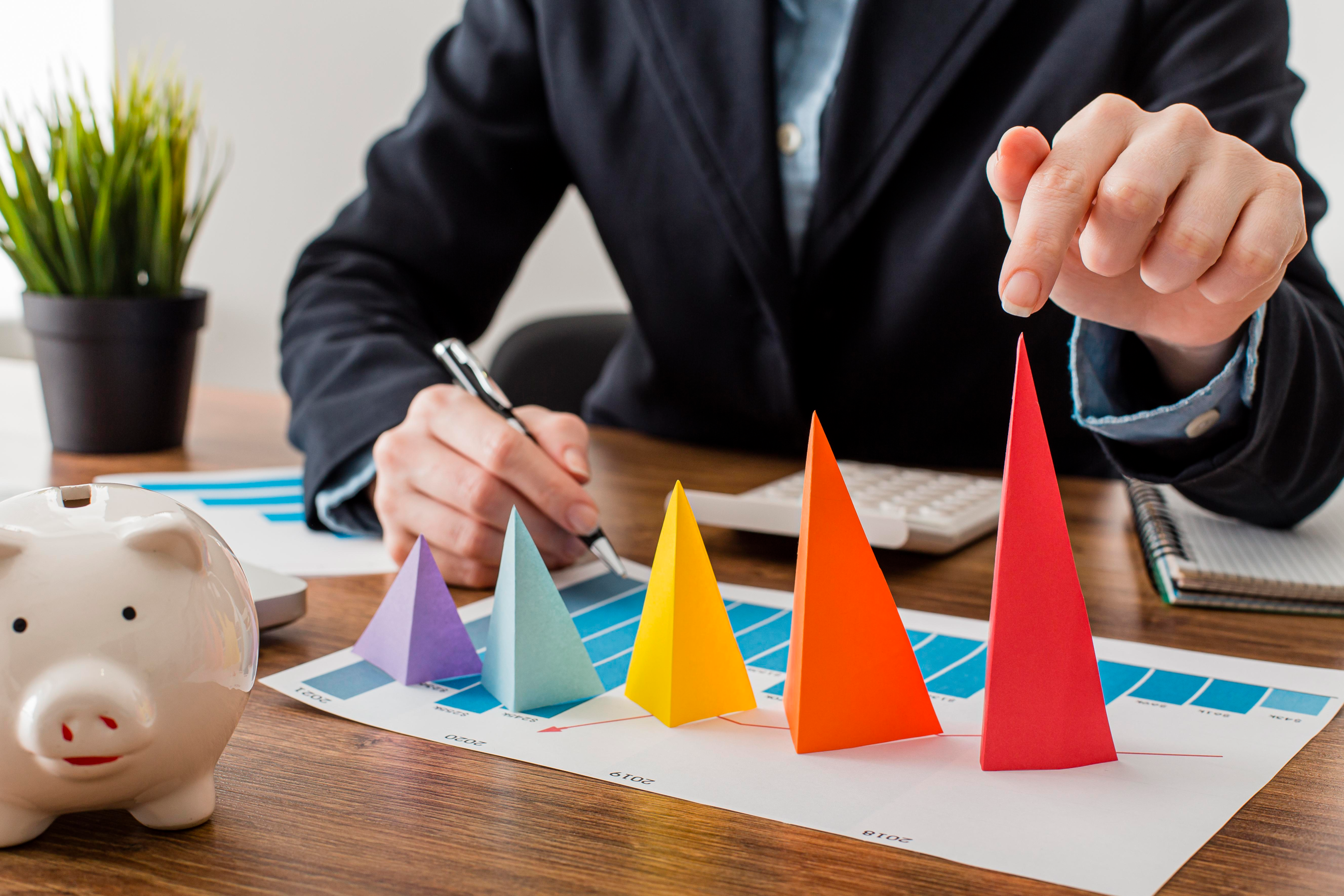 https://www.freepik.com/free-photo/front-view-businessman-with-colorful-cones-representing-growth_11383075.htm#page=2&query=cost%20efficient&position=48&from_view=search&track=ais