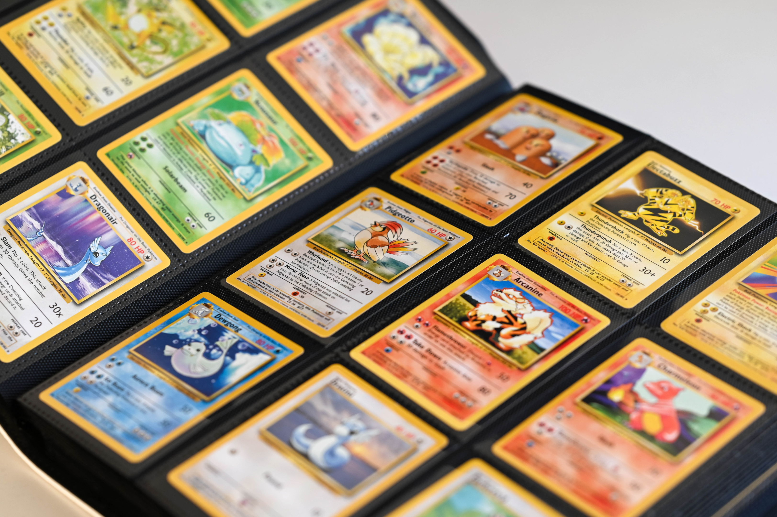 Pokemon cards neatly organized in a folder
