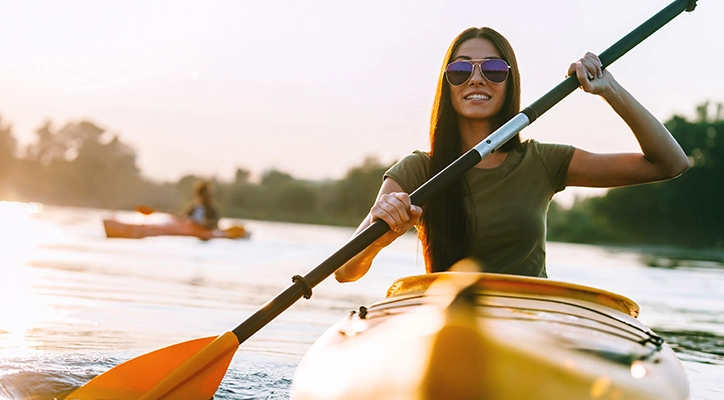 A lady kayaking close to San Diego