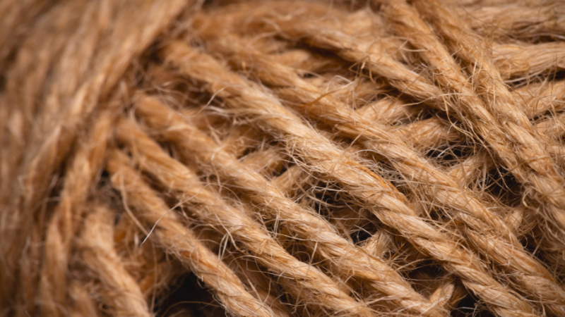A close up of a ball of jute fiber yarn
