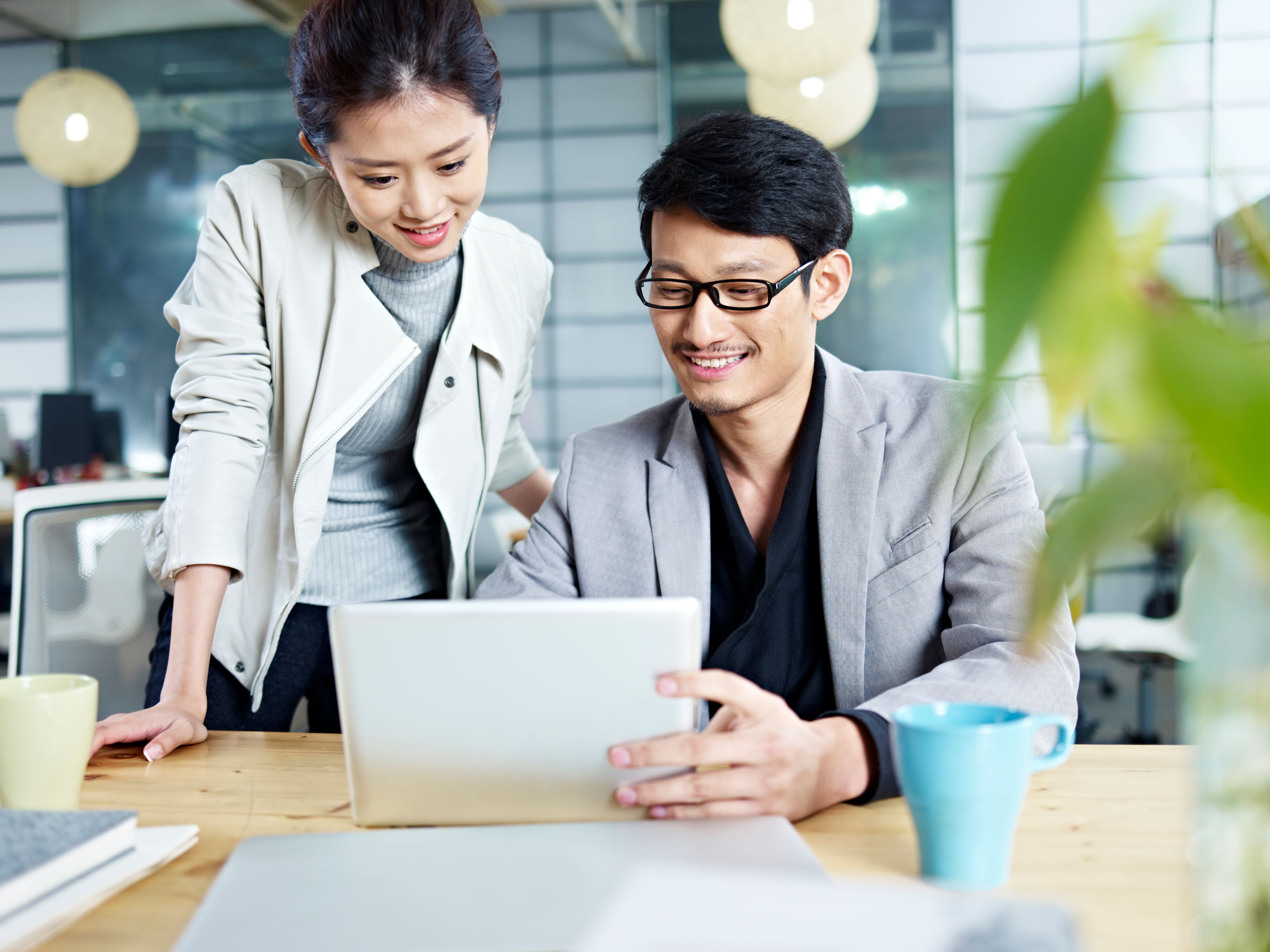 Japanese employees having a conversation