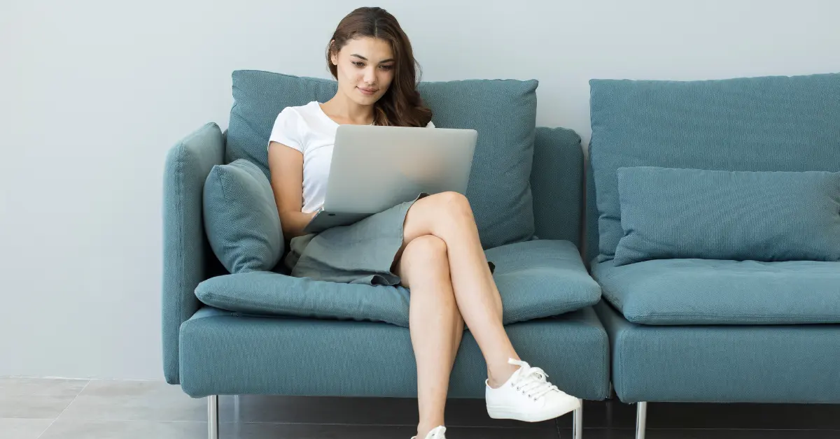 A woman checking tax amnesty program on her laptop.