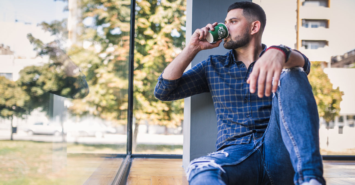 A person taking a break from work to manage stress and prevent burnout