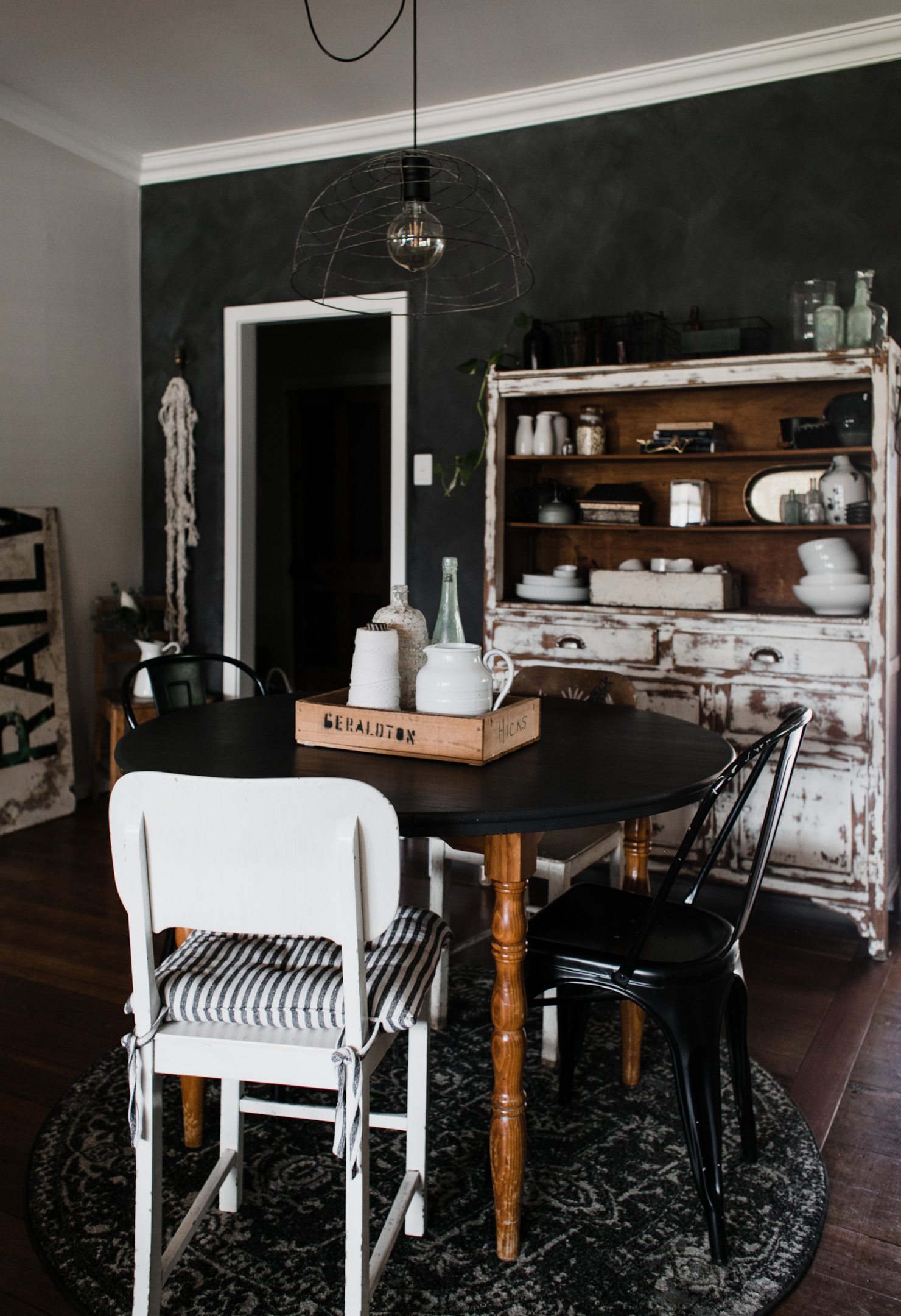 Image credit: https://www.pexels.com/photo/black-wooden-table-in-a-dining-room-with-different-chairs-6125625/