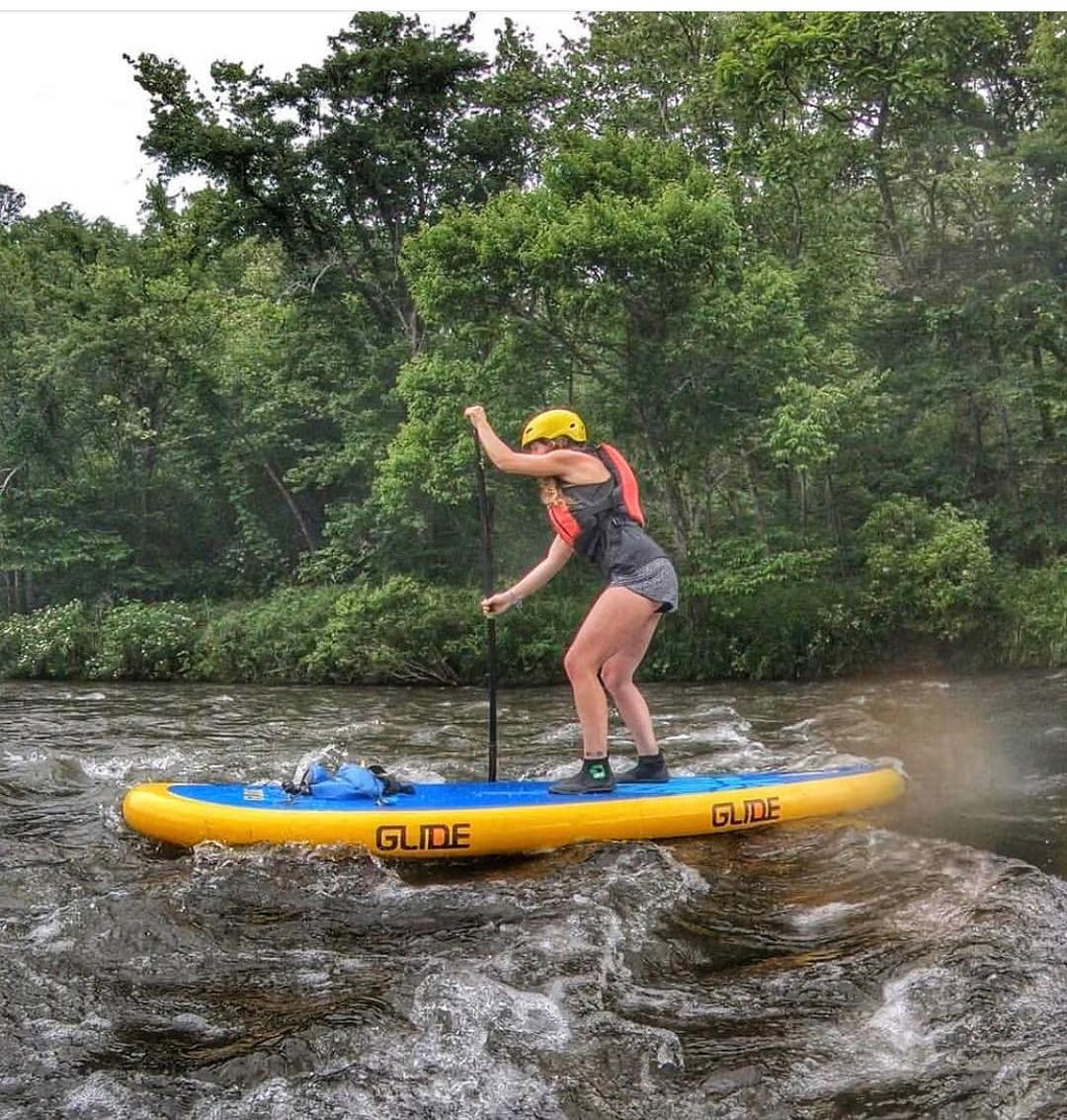 inflatable paddle board on a river